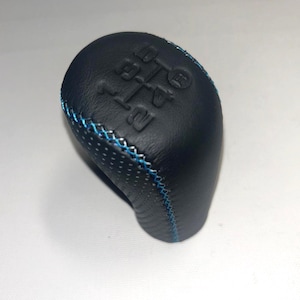 Gear Shift Knob For Tacoma, Camry, Corolla, RAV4 (05-15) 5-6 speed, anthracite grey, half perforated Leather, Thread 12x1.25 mm