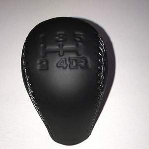 Manual Transmission Shift Knob Fit For Tacoma, 4runner (2005-2015) 5 speed, black with grey stitching. Thread pitch 12x1.25 mm