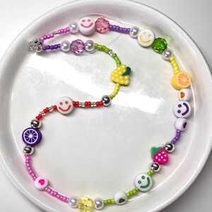 Multicoloured beaded phone charm