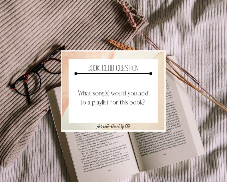 May include: An open book, reading glasses, and a card with the text "BOOK CLUB QUESTION" and "What song(s) would you add to a playlist for this book?" on a beige textured surface.