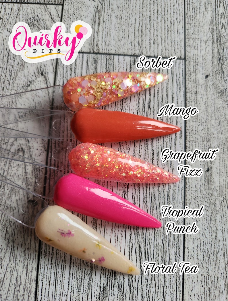 May include: Six different nail dip powder colors displayed on clear plastic sticks. The colors are: Sorbet, Mango, Grapefruit Fizz, Tropical Punch, and Floral Tea.