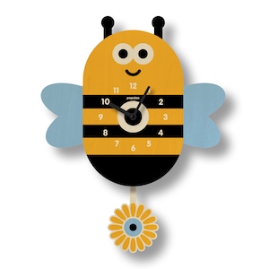 May include: A whimsical bee-shaped wall clock with a yellow and black body, light blue wings, and a flower pendulum. The clock face features black hands and the text "popclox". The clock measures approximately 12 inches in height.