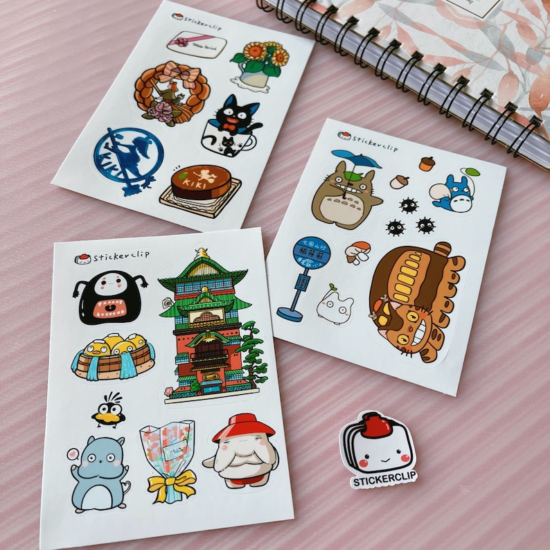 May include: A set of 4 sticker sheets featuring characters from the animated films My Neighbor Totoro and Kiki's Delivery Service. The stickers are printed on white paper with a glossy finish. The sticker sheets are packaged in a clear plastic bag. The sticker sheets are perfect for adding a touch of whimsy to your planner, laptop, or water bottle.