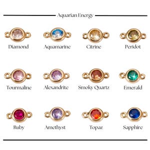 May include: Aquarian Energy: A chart of 12 gemstones, each set in a gold-toned ring, with the name of the gemstone below. The gemstones are: Diamond, Aquamarine, Citrine, Peridot, Tourmaline, Alexandrite, Smoky Quartz, Emerald, Ruby, Amethyst, Topaz, and Sapphire.