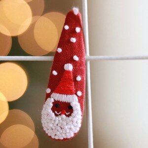 Red Santa Claus Hair Clips. Santa hair barrettes. Santa Snap Hair Clips. Santa Snap Clip with Snow Flakes.