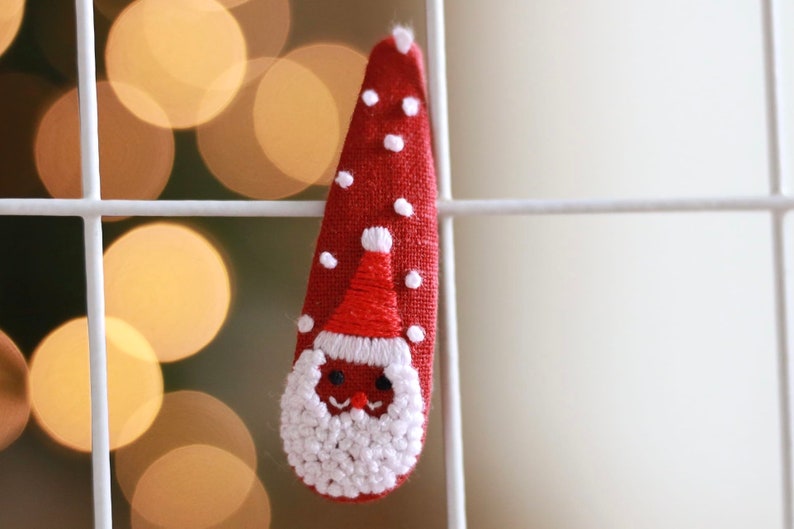 Red Santa Claus Hair Clips. Santa hair barrettes. Santa Snap Hair Clips. Santa Snap Clip with Snow Flakes.