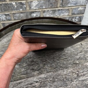 Gilt edges zippered black and gray bible