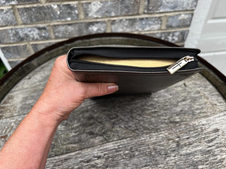 Gilt edges zippered black and gray bible