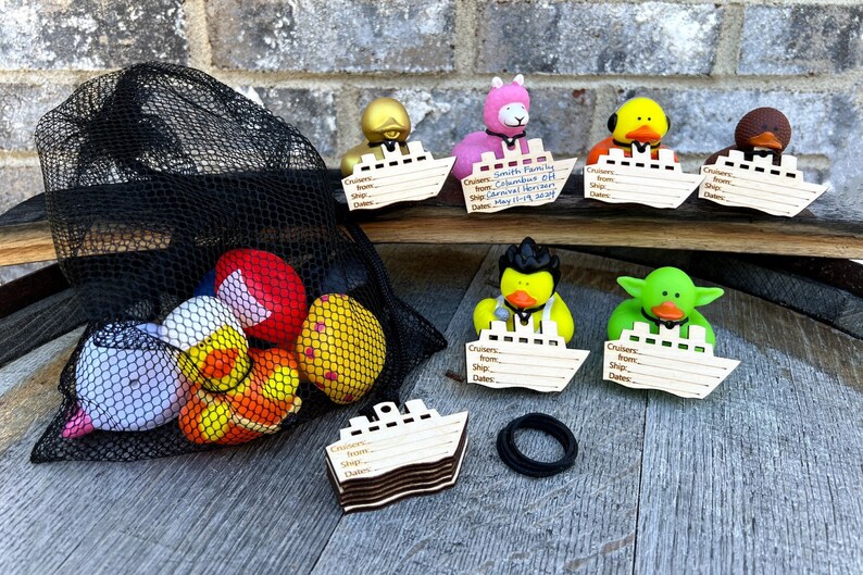 family gift for cruiser, set of rubber ducks with cruise ship tags in a black mesh storage bag