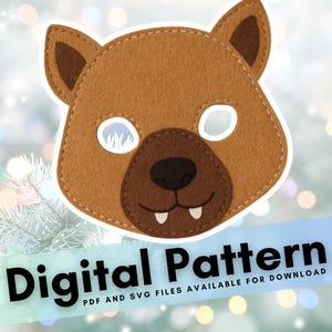 May include: A brown felt animal mask with a white outline, featuring eye holes, a dark brown nose, and two white teeth. The mask is labeled "Digital Pattern" with PDF and SVG files available for download.