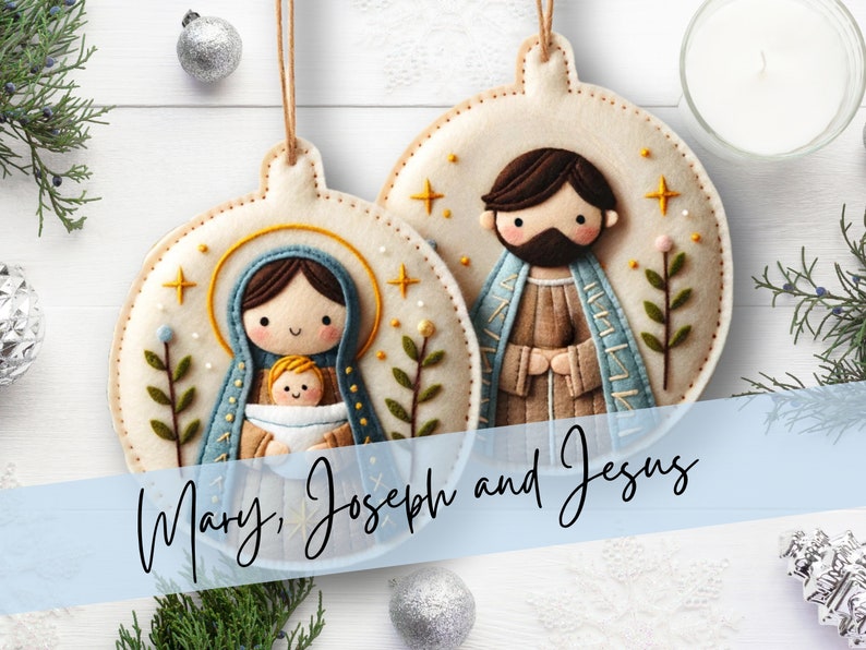 May include: Two felt Christmas ornaments depicting Mary, Joseph, and baby Jesus. The ornaments are round and feature a white background with embroidered details. The ornaments are hung with twine.