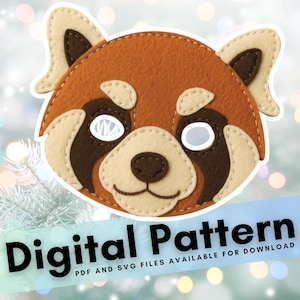 May include: A felt red panda mask with tan and brown accents. The mask has white eye cutouts and a stitched outline. Text at the bottom reads "Digital Pattern" and "PDF and SVG files available for download."