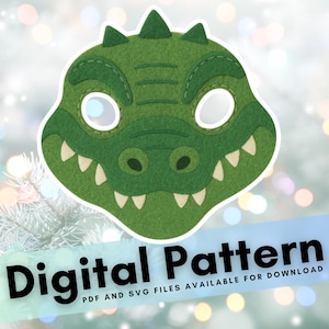 Peut inclure: Un masque d'alligator en feutre vert avec des trous pour les yeux blancs, des dents blanches et un design détaillé. Le masque fait partie d'un motif numérique, avec les mots "Digital Pattern" en grandes lettres noires.