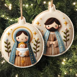 May include: Two felt Christmas ornaments depicting the Holy Family. The ornament on the left features Mary holding baby Jesus, while the ornament on the right features Joseph. Both ornaments are decorated with stars, leaves, and a white background.
