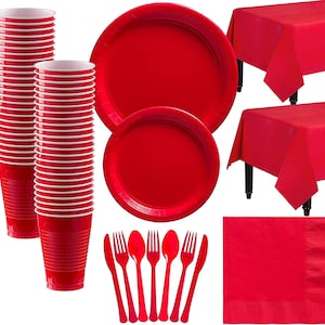 May include: Red plastic party supplies including plates, cups, napkins, forks, spoons, and knives. Two red plastic tablecloths are also included.