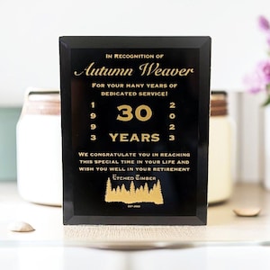 Black glass plaque with gold writing award plaque