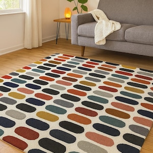 Hand-Tufted Wool Rug: Modern Multicolor Oval Dot Design