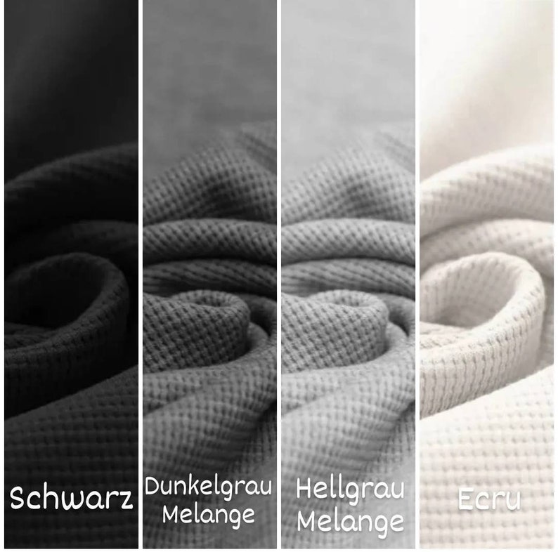 May include: Close-up of four fabric swatches in different colors: black, dark gray, light gray, and ecru. The fabric has a waffle texture.