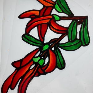 May include: A stained glass design featuring a branch with red and orange flowers and green leaves.