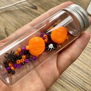 Pumpkin Themed Sensory Jar - Halloween baby sensory - Spooky Sensory Jar - Baby Sensory - Tummy Time - Great addition to treasure baskets
