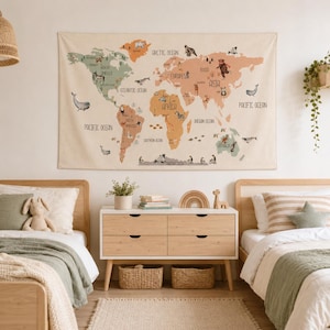 May include: A rectangular wall tapestry featuring a world map with muted pastel colors. The map displays continents, oceans, and various animal illustrations placed across the regions. Text labels identify the continents and oceans clearly.