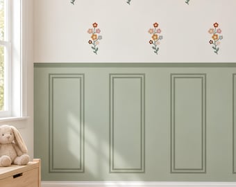May include: A wall featuring a sage green wainscoting panel design on the lower half and an off-white upper section decorated with a repeating pattern of small, multi-colored floral sprigs in shades of orange, pink, blue, and brown.