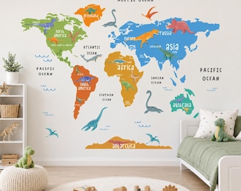 May include: A wall decal featuring a world map with continents in green, orange, and blue, labeled with ocean and continent names. Various colorful dinosaur illustrations are positioned across the landmasses and oceans on a light background.