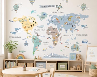 May include: A wall decal featuring a world map with pastel-colored continents, labeled oceans, and illustrations of animals, hot air balloons, and an airplane. The text "OLIVER'S WORLD MAP" is displayed near the top center of the map graphic.