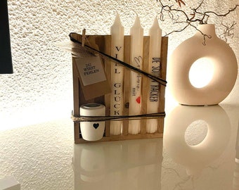 Personalized candles with a loving wooden gift packaging.Birthday, wedding, baptism... or just like that.