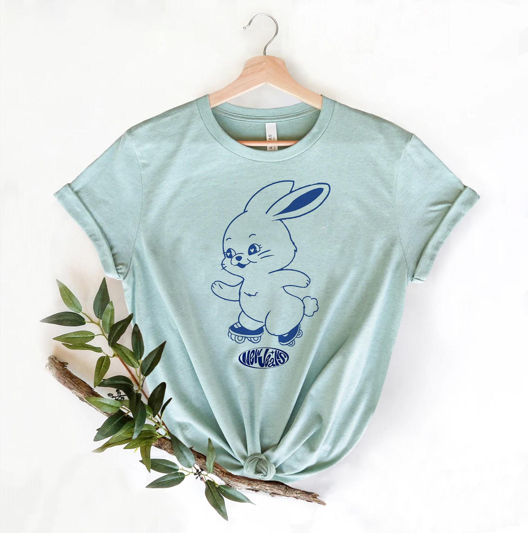 Discover NewJeans Bunny Logo Shirt, NewJeans Tokki Shirt, Hype Boy Shirt, Bunny Fan Lover Shirt