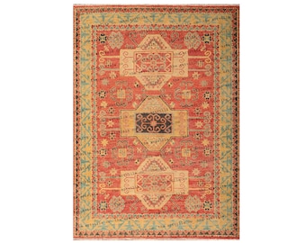 May include: A red, yellow, and blue patterned rug with a central medallion. The rug has a traditional design with intricate details.