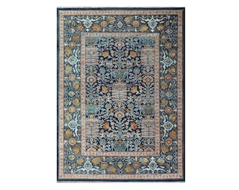 May include: A blue rug with a floral pattern and a border of intricate designs in shades of orange, cream, and blue.