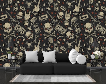 May include: A black couch with white pillows in front of a black and white wallpaper with a skull, guitar, microphone, and other rock and roll themed designs.