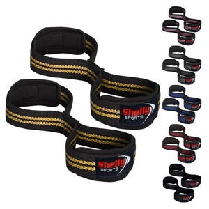 May include: A pair of black lifting straps with yellow stripes and the text "Shelly Sports" printed on them. The straps are designed to help with lifting weights.