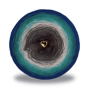 May include: A skein of yarn in shades of blue, teal, grey, and white. The yarn is wound into a ball shape and has a gold heart charm attached.