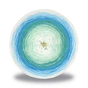 May include: A round ball of yarn with a gradient of colors, including white, light blue, and green. A small gold-colored heart charm is attached to the center of the yarn ball. The yarn appears to be soft and suitable for knitting or crochet projects.