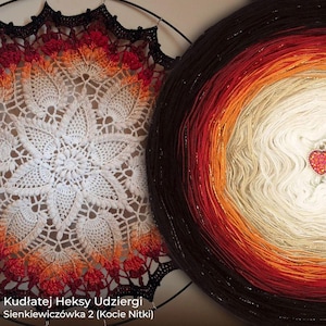May include: A circular crochet mandala with a white center transitioning to orange, red, and black edges, paired with a circular yarn wall hanging featuring a gradient from white to black with a small heart-shaped embellishment in the center.