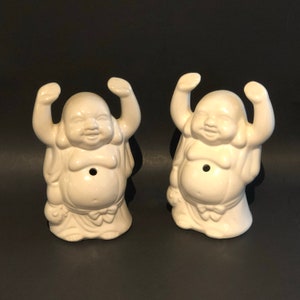Vntg Pair ceramic laughing Buddhas, cup w/straw hole