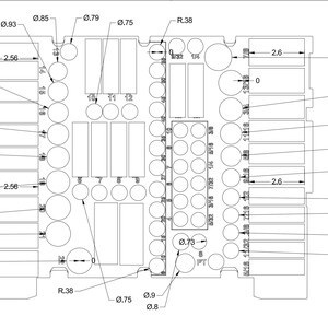 May include: A detailed technical drawing of a rectangular component with various circular and rectangular cutouts. Dimensions are provided in inches, including diameters and lengths, such as 2.56 inches and 0.93 inches.