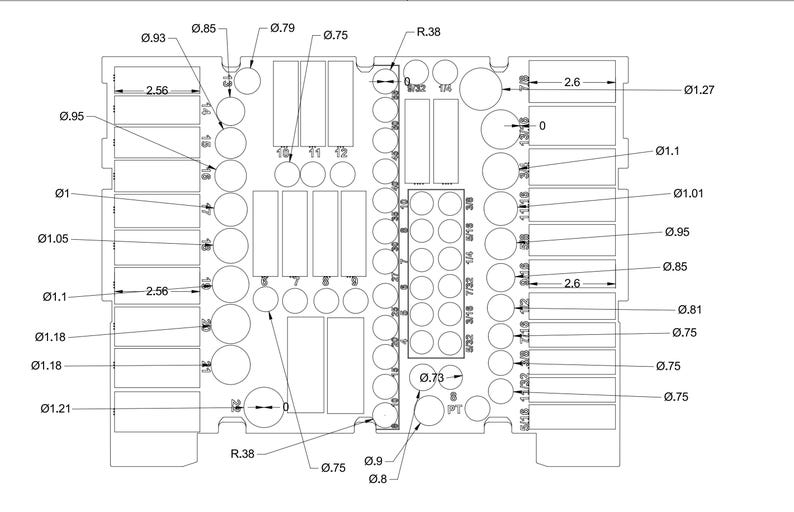 May include: A detailed technical drawing of a rectangular component with various circular and rectangular cutouts. Dimensions are provided in inches, including diameters and lengths, such as 2.56 inches and 0.93 inches.