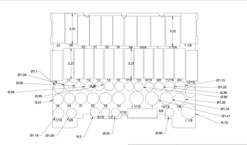May include: Technical drawing of a rectangular object with various circular and rectangular cutouts. Dimensions are provided in inches, including heights of 3.22 and 3.27 inches, and diameters ranging from 0.96 to 1.18 inches.