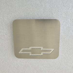 1999-06 Chevy Silverado Bowtie Bottom Center Cubby Vent Filler Panel