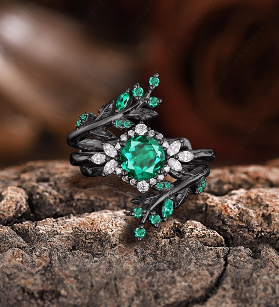 Black gold emerald engagement rings discount