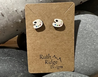 Pendiente tipo botón con paleta de arte