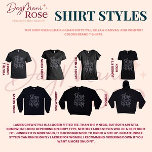 May include: Image showcasing various black t-shirt styles, including crew neck, V-neck, long sleeve, and hoodie. Each shirt features the text "Slay the Day" in a stylized font. The image also includes the shop's logo and brand information.