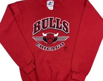 pull ras du cou vintage des Chicago Bulls des années 90. Fabriqué aux États-Unis. De grande qualité. Taille petit pour homme.