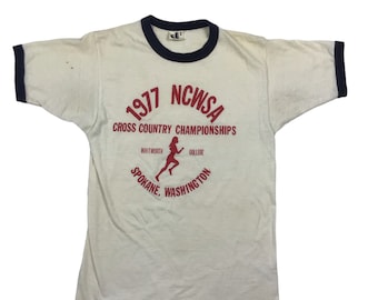 1977 Whitworth College cross country championships vintage ringer Tshirt.  Measures as an XS. 17 inches pit to pit, 25 inches long.