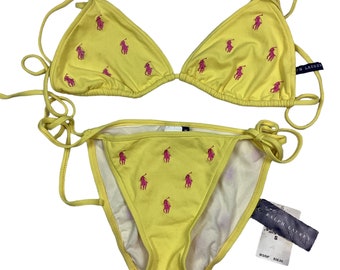 Y2K Ralph Lauren yellow/pink bikini. Tag removed for garment washing, but has never been worn. Tagged as a small. No rips or tears.