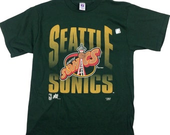 Vintage 1994 Seattle Supersonics NBA T-shirt. Dead stock, never worn. Tagged as a large: Green.