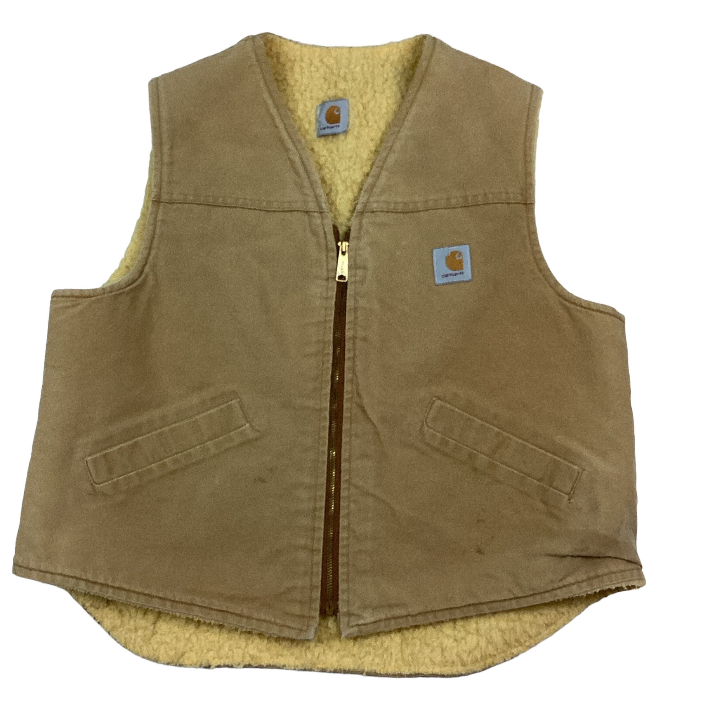 Vintage Carhartt Sherpa lined vest. Steel zip. High quality. Two front slide pockets. Size tag is missing measure has a large